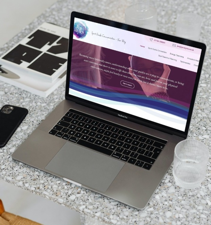 A new website design shown on a laptop screen